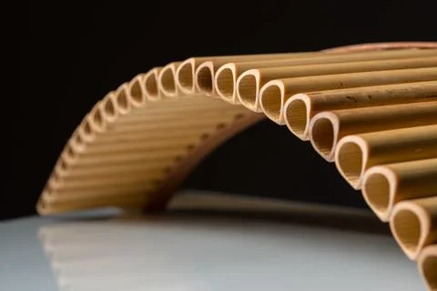 Closeup of a pan flute on a table Stock Photos