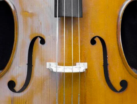 Closeup of part string instrument cello with f holes Stock Photos