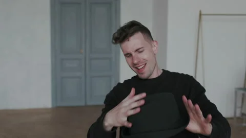 Closeup. Passion handsome guy wearing black, dancing authentic choreography with Stock Footage 107815874