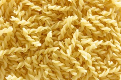 Closeup pasta texture background.  staple food of traditional italian cuisine Stock Photos