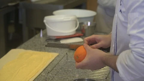 Closeup of pastry chef making roll cake with pastry dough Stock Footage 107545294