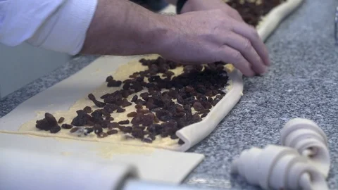 Closeup of pastry chef making roll cake with pastry dough Stock Footage 107545388