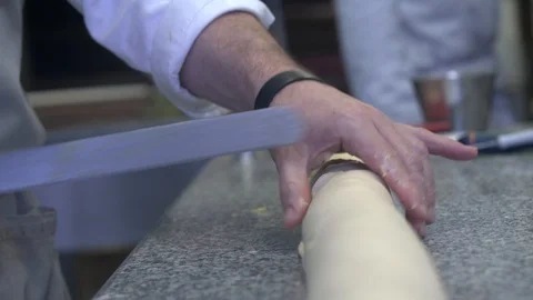 Closeup of pastry chef making roll cake with pastry dough Stock Footage 107545460