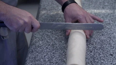 Closeup of pastry chef making roll cake with pastry dough Stock Footage 107545474