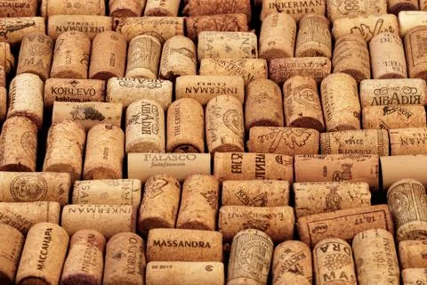 Closeup pattern background of many different wine corks with dates and drops  Stock Photos