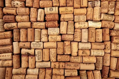 Closeup pattern background of many different wine corks with dates and drops  Stock Photos