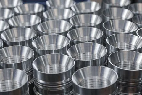 Closeup pattern of shiny circular precision stainless steel industrial machine Stock Photos