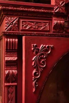Closeup of patterned old renovated cupboard with nice hand carved ornaments with Stockfoto's