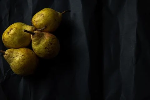Closeup of pears on dark background Stock Photos