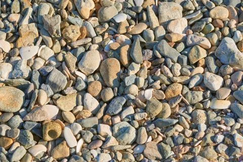 Closeup of pebbles in a beach Stock Photos