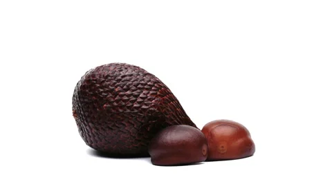 Closeup of peeled salak fruit. Rotating on white background. Stock Footage 157088095