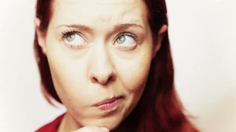 Closeup of pensive redhead Video stock 8559357