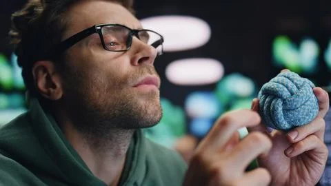 Closeup pensive software developer working computer at server room. Man playing 库存照片