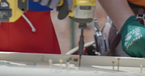 Closeup of People Using Drills Stock Footage 200842983
