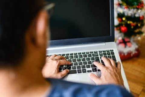 Closeup, People using laptop computer devices at home. A man typing a keybo.. Stock Photos