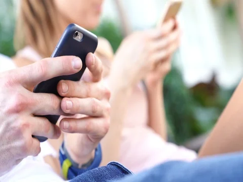 Closeup of people using smartphone Stock Footage 85185266