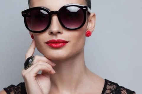 Closeup of perfect model in big rounded sunglasses. text space and copy space Stock Photos