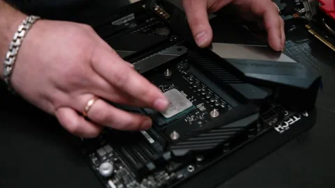 Closeup of person applying thermal paste to the central processing unit Stock Footage 171079275