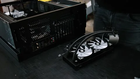 Closeup of person assembling water cooling system for central processing unit Stock Footage 171079249