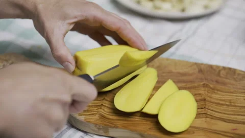 Closeup of person cutting up mango into squares Stock Footage 341242694