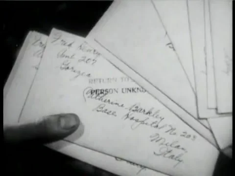 Closeup of person looking through returned mail, 1930s Stock Footage 58858802
