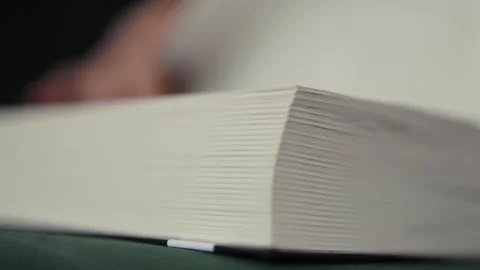 Closeup of a person reading a book. Stock Footage 314834596
