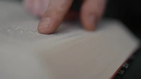 Closeup of a person reading a book. Stock Footage 314834672