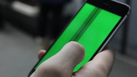 Closeup person uses mobile phone with green screen Video stock 123722006