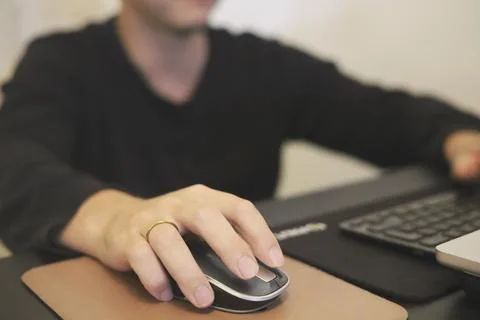 Closeup of a Person Using Computer Mouse Stock Photos