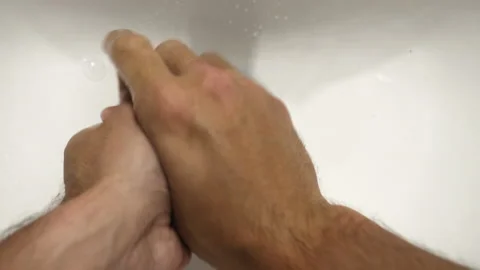 Closeup Of A Person's Hand Washing With Soap Under Clean Tap Water From A Stock Footage 132899124