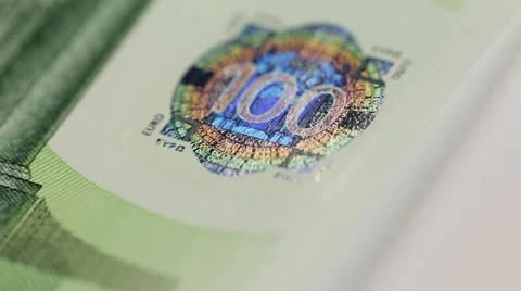 Closeup photo of a part of one hundred hundred euro note including hologram Stock Footage 62575561
