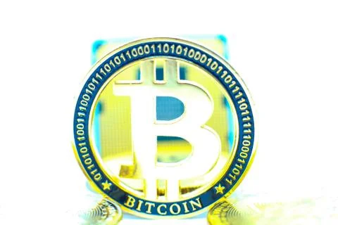 Closeup of physical bitcoin and computer cpu processor Foto stock