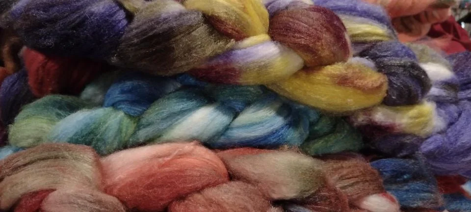 Closeup pic of braided wool fiber in hand dyed colors Stock Photos
