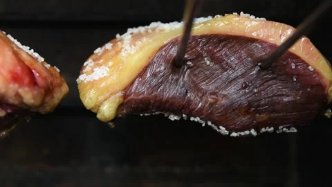 Closeup of a picanha roasting on the grill. Stock Footage 149068438