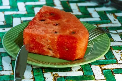  closeup of piece of watermelon on table Stock Photos