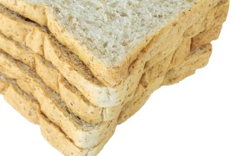 Closeup pile of sliced bread on white background. Stock Photos