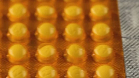 Closeup of pills lying on table. Illness and sickness concept Stock Footage 72722053
