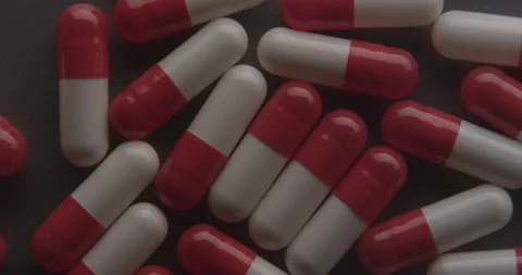 Closeup pills shot on table Stock Footage 146445649