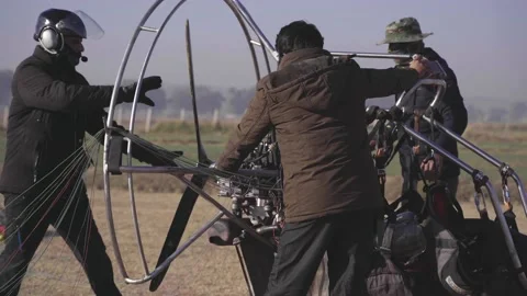 Closeup Of Pilot Preparing For Paraglider Take Off In Pakistan Stock Footage 170770682