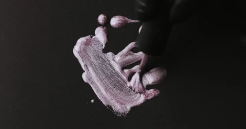 Closeup of pink glitter background in studio waves and shines bright.  Video stock 149364718