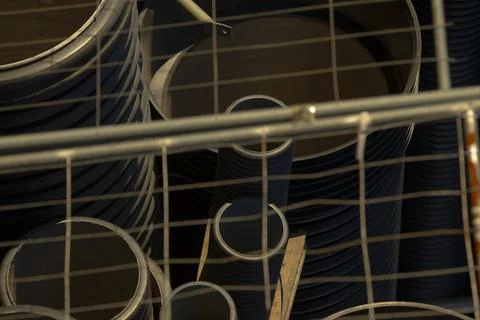 Closeup of pipe interiors featuring textured rings and contrasting surfaces 写真素材