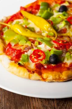 Closeup of a pizza on a plate Stock Photos