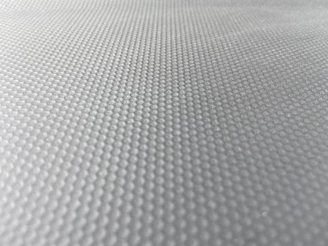 Closeup of the plastic gray mesh surface Stock Photos