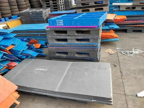 Closeup Plastic pallets warehouse Stock Photos