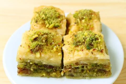 Closeup a Plate of Delectable Square Shaped Baklava Pastries Stock Photos