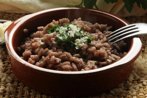 Closeup of a plate of red wine risotto Stock Photos