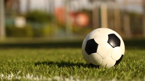 Closeup of a player taking a slide tackle on a ball slide tackle Stock Footage 44039835