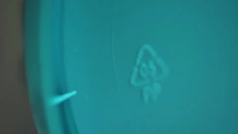 Closeup polypropylene recycle label. Spbd macro shot of 0,5 pp sign and arrows Stock-Footage 135784056