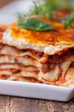 Closeup of a portion of lasagna Stock Photos