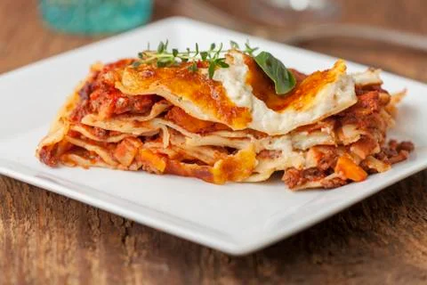 Closeup of a portion of lasagna Stock Photos